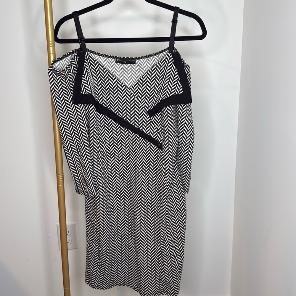 Beautiful fashion to figure dress, gently worn. Black and white. Classy.